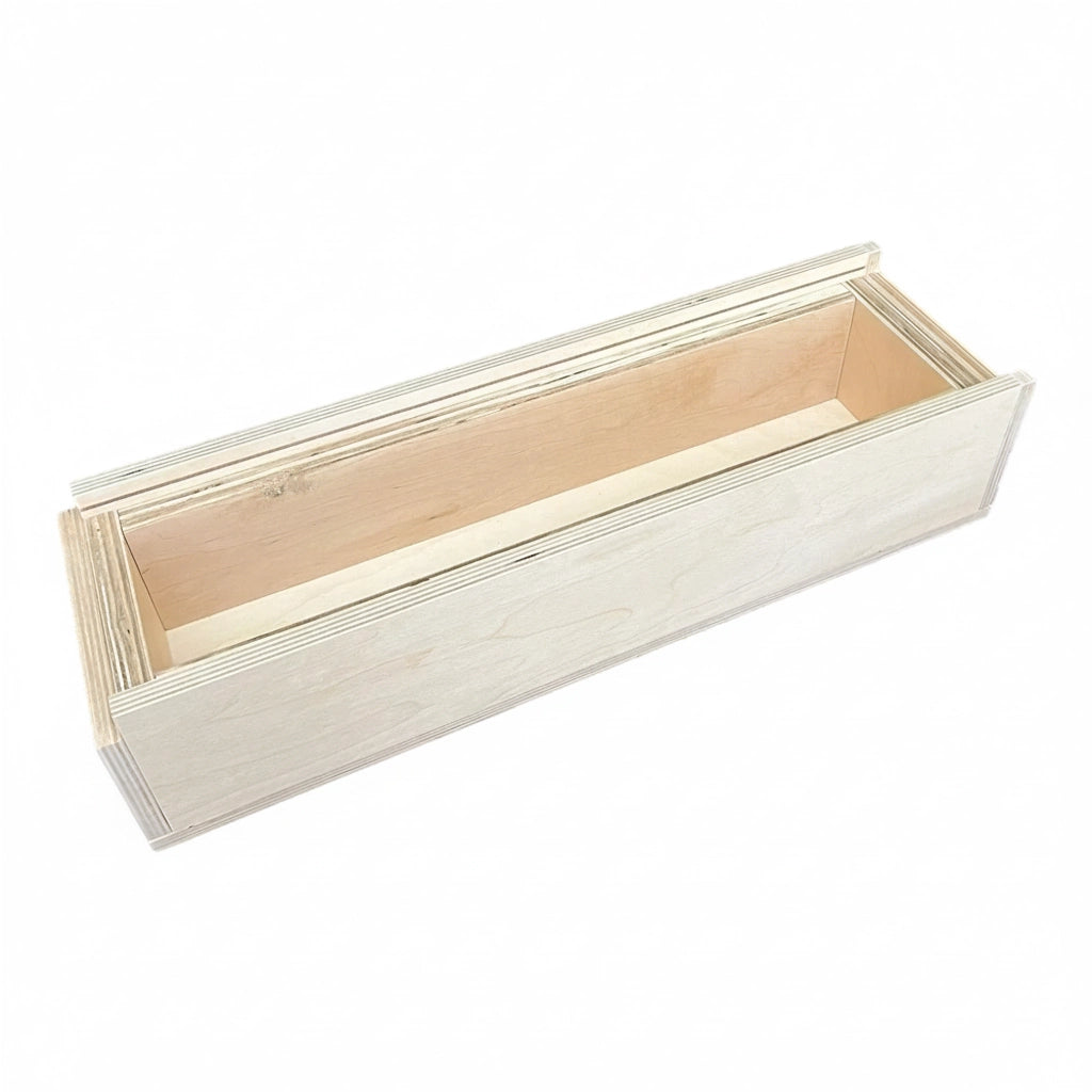 Empty long wooden soap mold with pale plywood sides