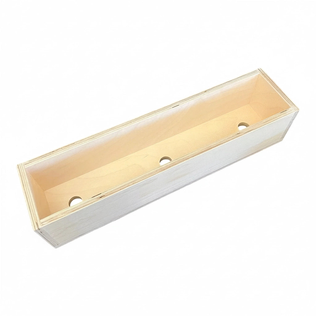 Empty long wooden mold box, three holes in the base