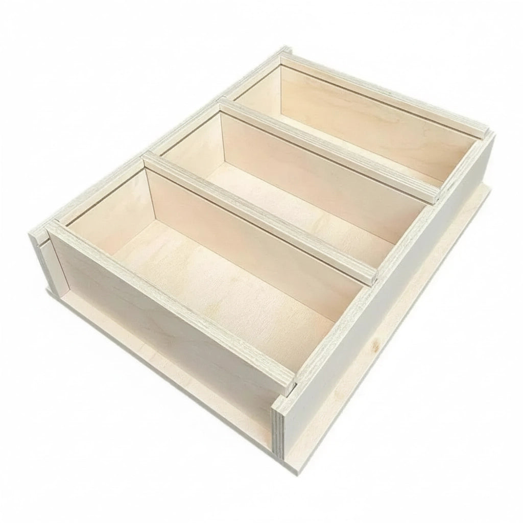 Wooden soap mold frame with three empty plywood compartments