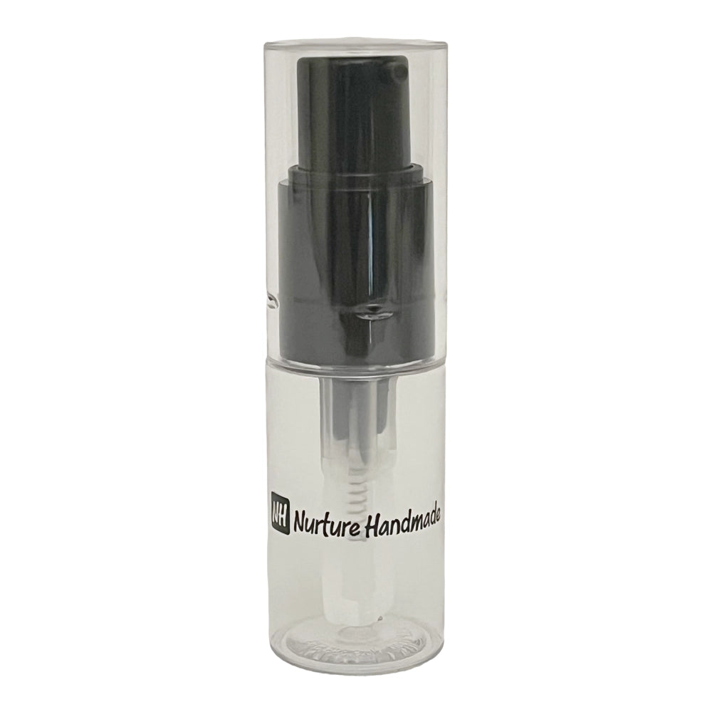 Clear spray bottle with black nozzle on a white background, featuring 'Nurture Handmade' branding.