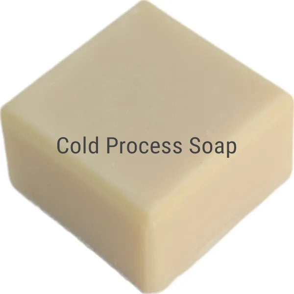 Pale beige soap cube labelled Cold Process Soap