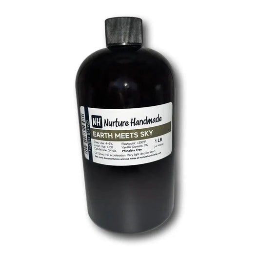 Bottle of Earth Meets Sky fragrance oil featuring grapefruit, patchouli, vanilla, and tonka bean aromas.
