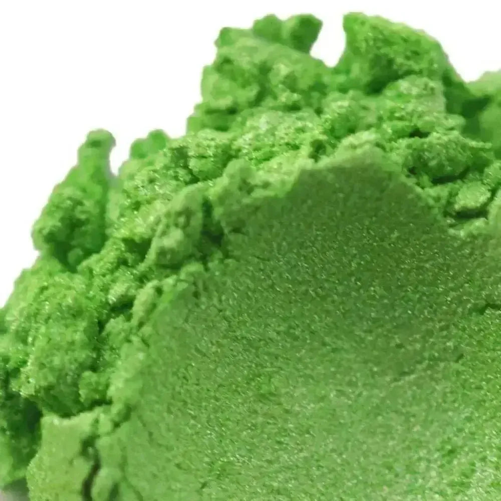 Mound of bright lime green mica powder with shimmer