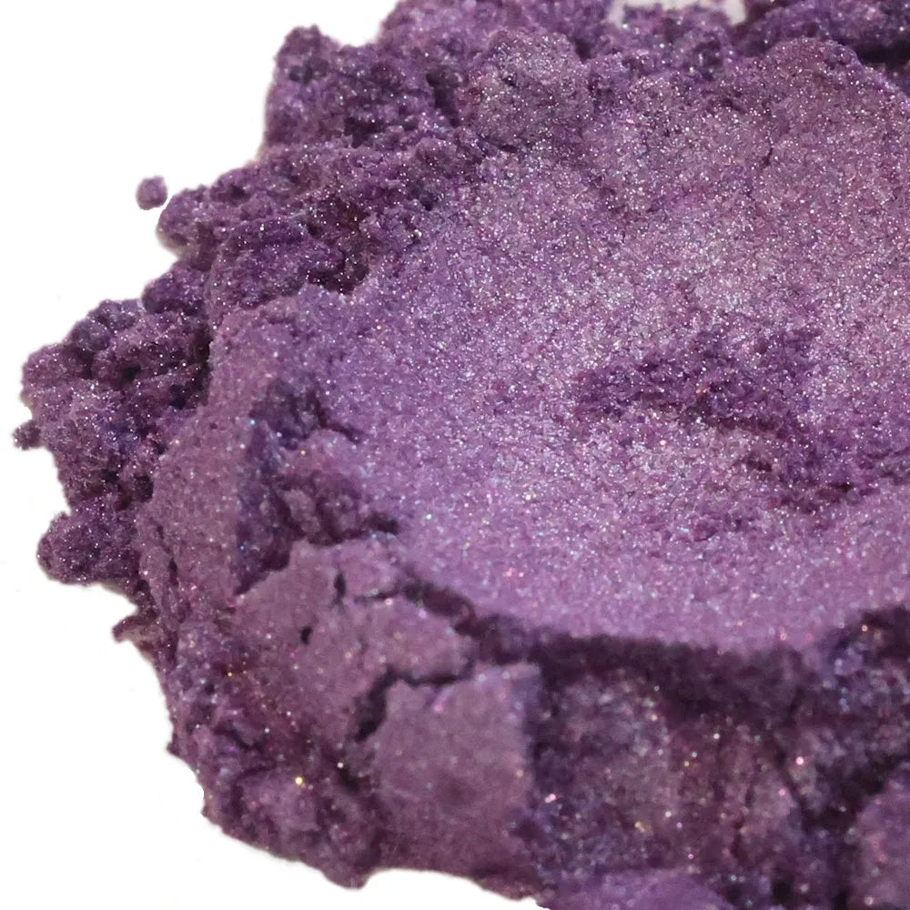 Mound of purple mica powder with violet pearly shimmer