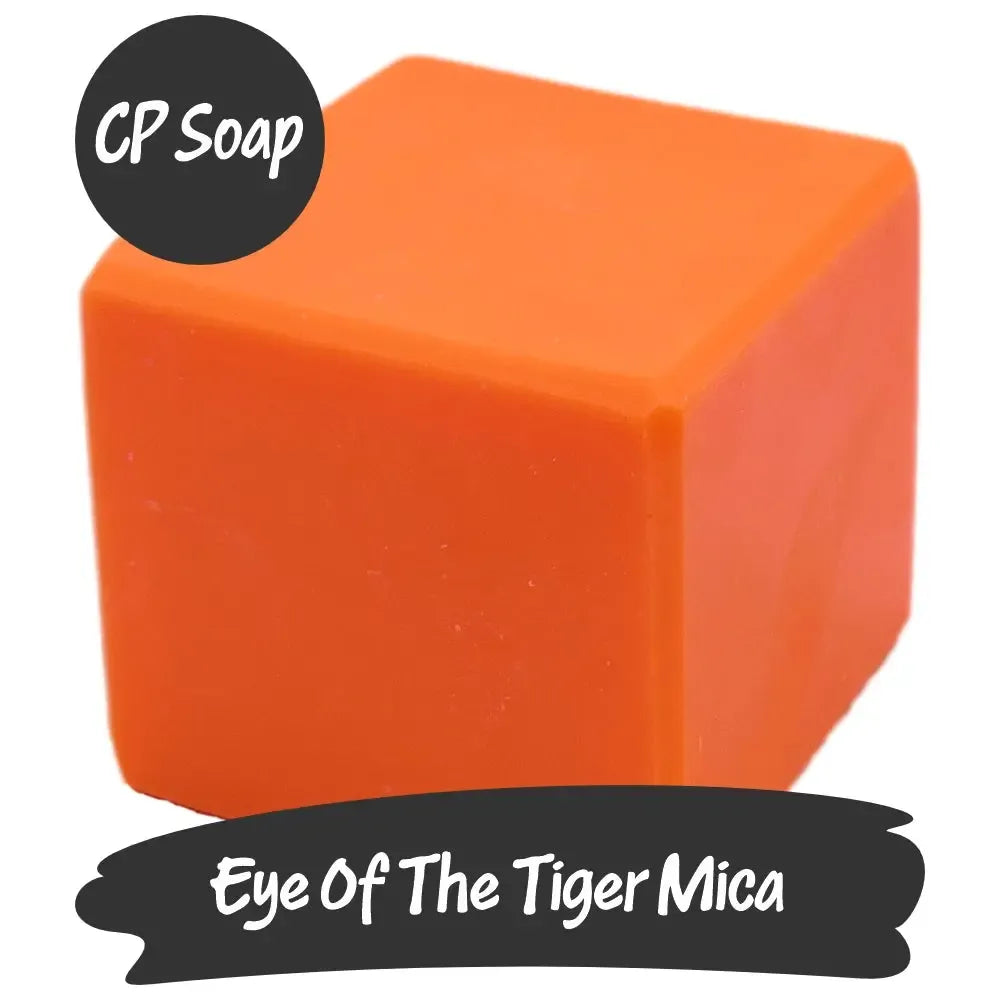 Bold orange cube of Eye of the Tiger Mica Blend soap by Nurture Handmade, showcasing vibrant colors and handmade beauty.