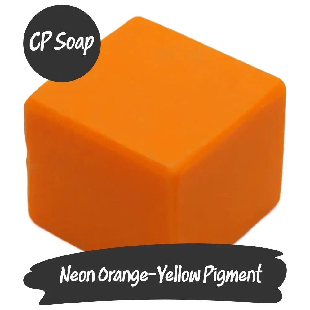 Vibrant Neon Orange-Yellow soap pigment cube perfect for adding color to creative projects.