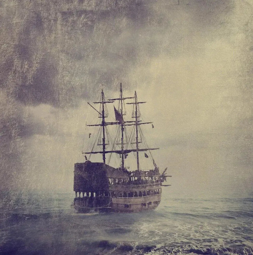 A vintage ship sailing through misty waters, evoking a sense of adventure and exploration.