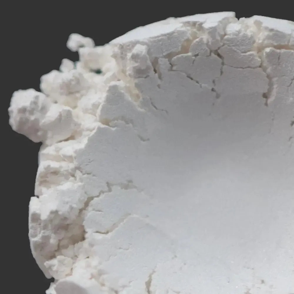 Winter White Mica: fine white powder mound with crumbly texture