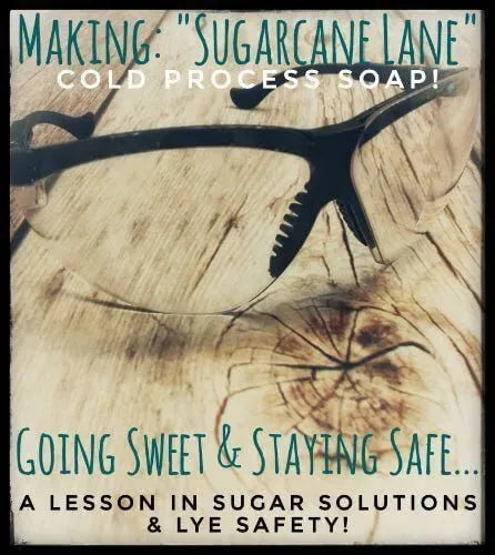 Vintage black-framed eyeglasses on rustic wood in sugar and lye safety lesson