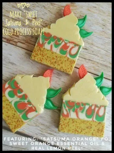 Colorful cold process soap bars resembling citrus fruits with lemon peel and satsuma orange accents.