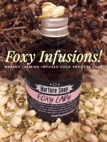 Nurture Soap Foxy Lady jasmine-infused cold process soap bottle surrounded by dried jasmine flowers