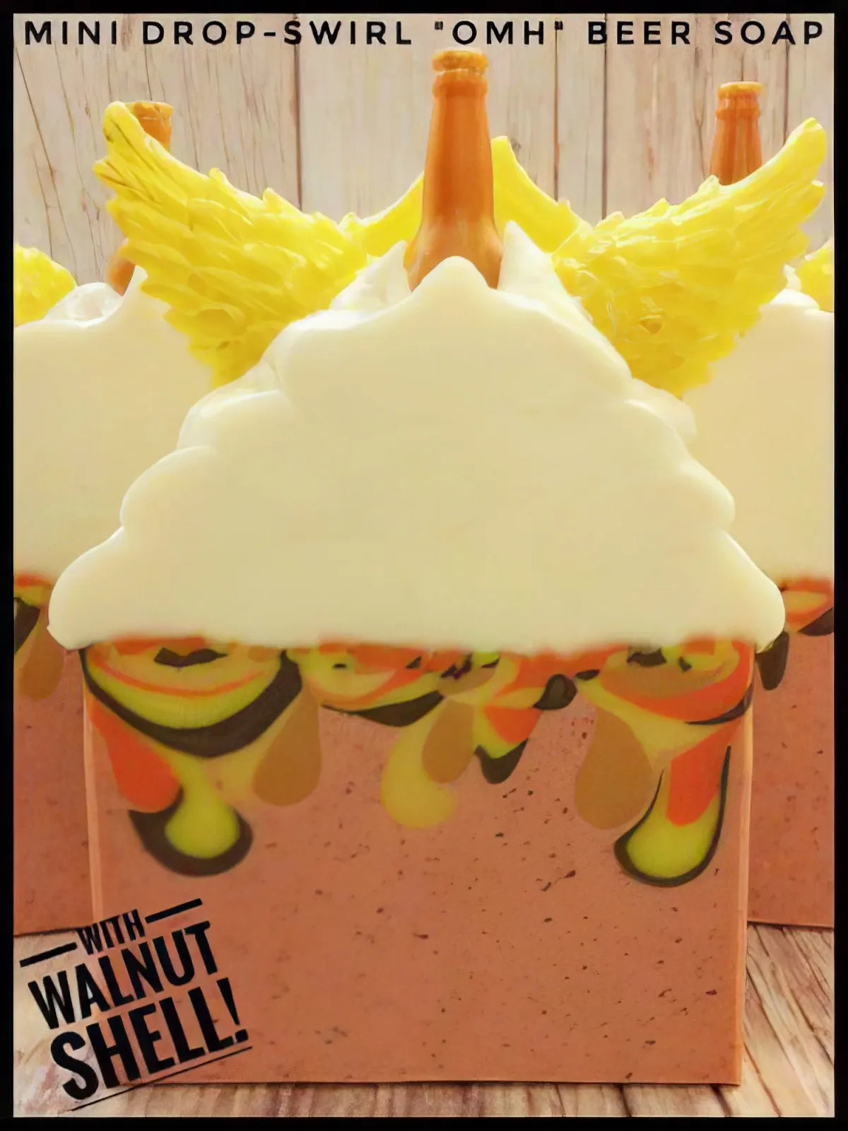 Beer soap bars with white frosting, yellow wing and bottle embeds