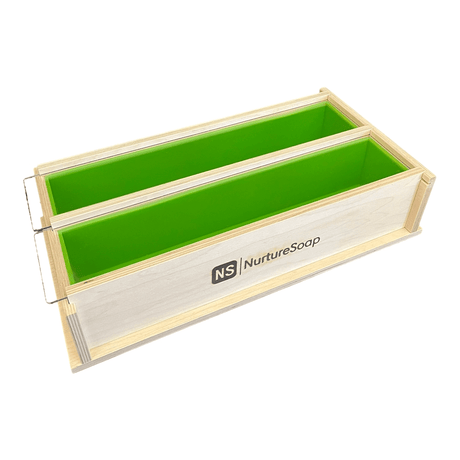 Wooden mold box with green liners from Nurture Soap.