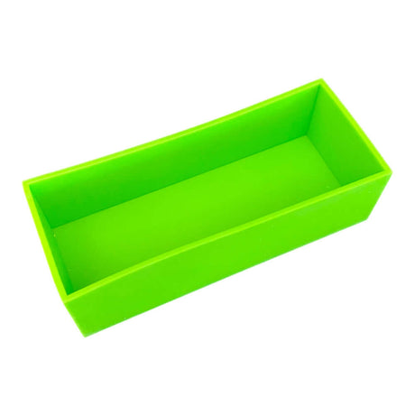 Green rectangular silicone liner, durable and tear-resistant, made with a process that strengthens and extends the lifetime of the silicone.