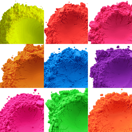 Bright neon pigment powders in yellow, red, pink, orange, blue, purple, magenta, green, and coral arranged in a grid.