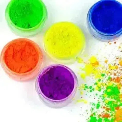 Vibrant color pigments in jars, featuring green, yellow, orange, purple, and blue for crafts, soaps, and cosmetics.