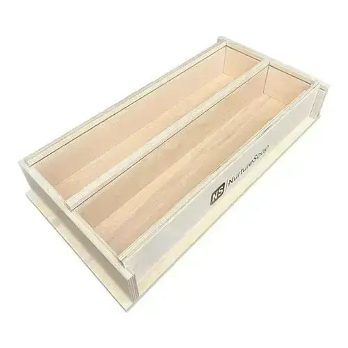 Durable wood soap mold with two compartments, featuring removable sides for easy unmolding and a professional finish.