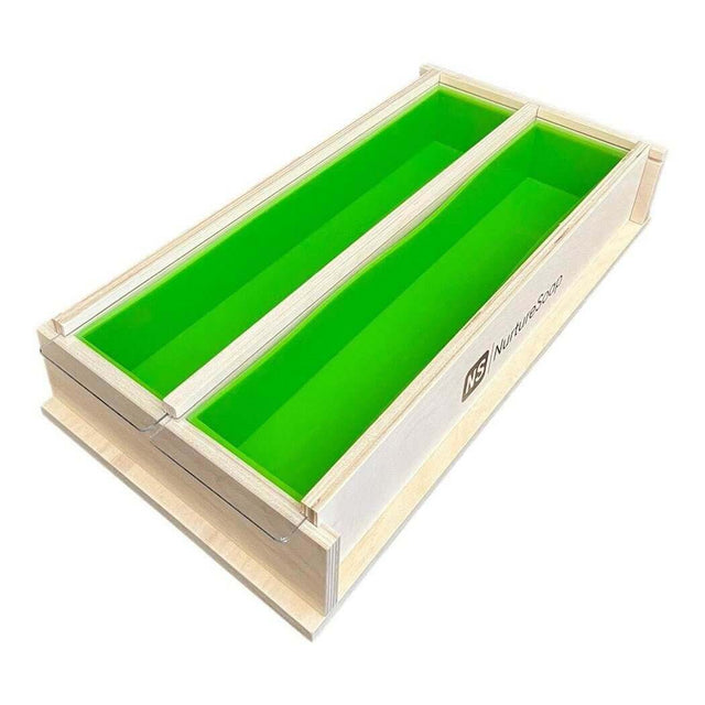 Wooden dual soap mold with green silicone liners by Nurture Handmade.