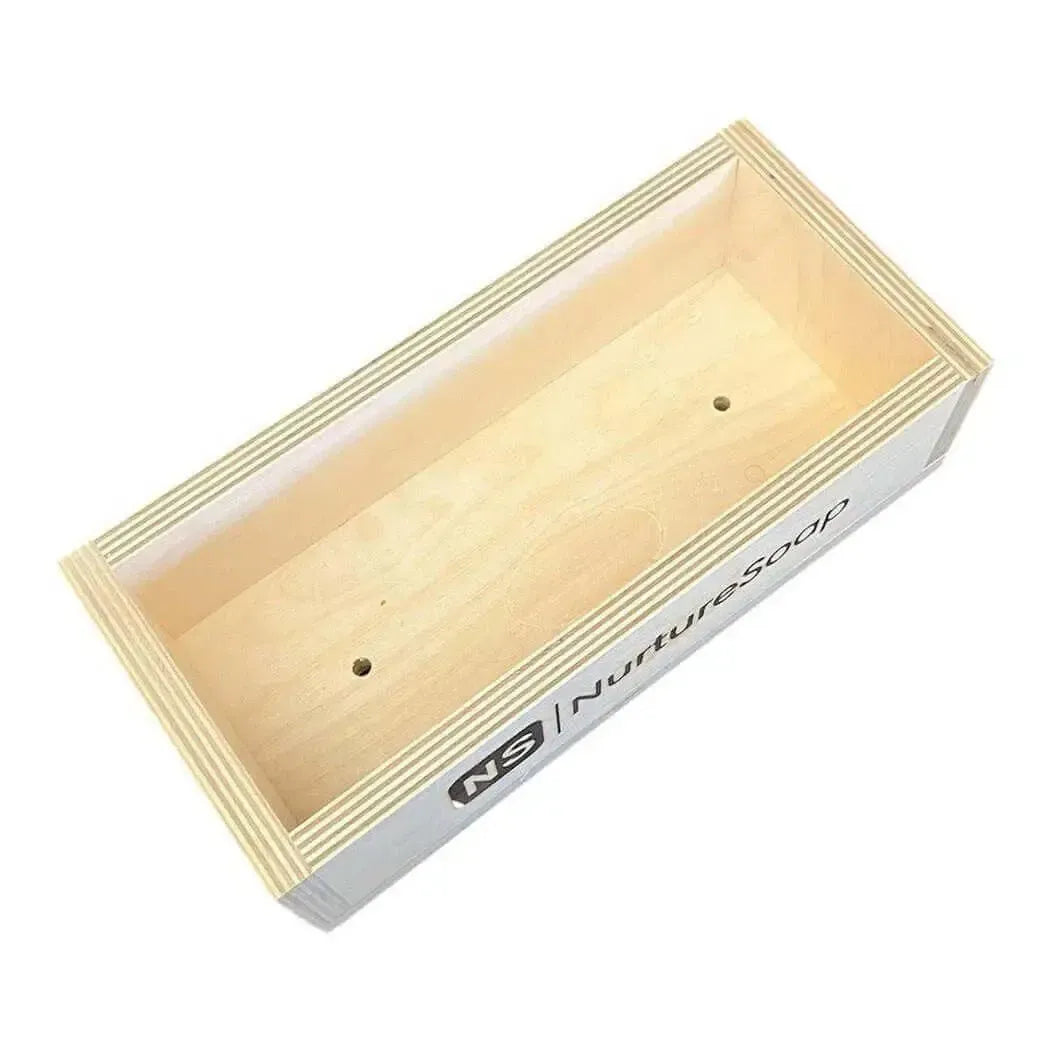 2.5 lb handle soap mold for easy soapmaking, featuring silicone sides and durable wood construction.