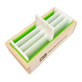 Light wood soap mold with white and green swirl divider inserts, nurturesoap brand