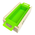Bright green silicone 2.5 lb soap mold in light wood crate with handles