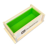 Handmade wooden soap mold by Nurture Soap with a green silicone lining for crafting and shaping soap bars.