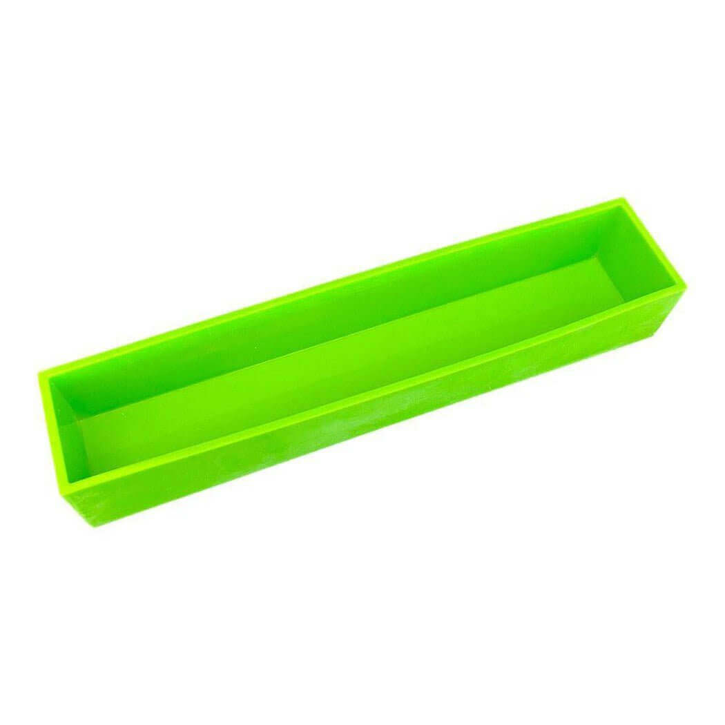 Green rectangular silicone mold for handmade soap, ideal for nurturing your DIY projects and crafts.