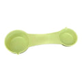 Light green silicone 4-way measuring spoon with two compartments