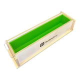 Wooden soap mold with green interior by Nurture Handmade, ideal for DIY soap making and crafting.