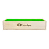 Wooden soap mold box by NurtureSoap for handmade soap making, featuring a natural finish and green interior.