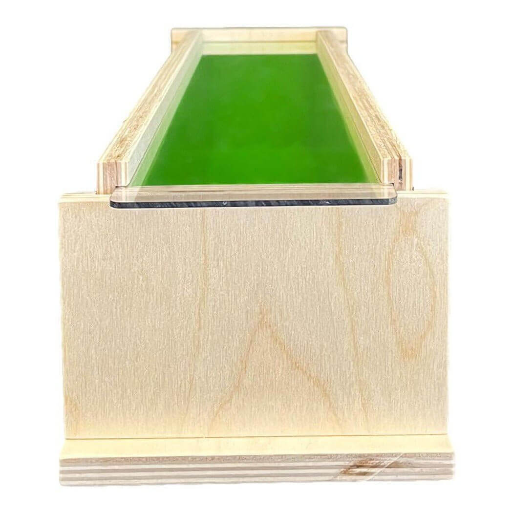 Wooden handmade soap mold with green interior for crafting Nurture Handmade products.