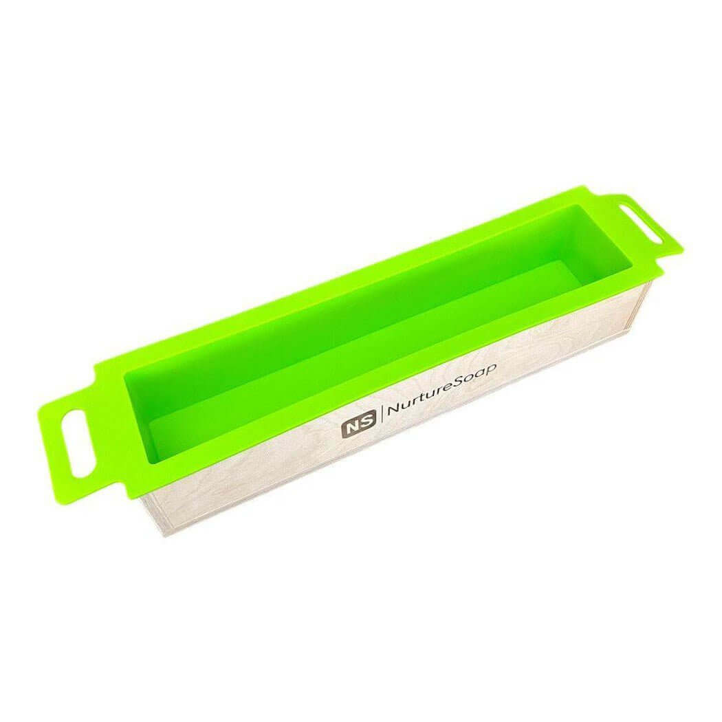 Nurture Handmade soap mold with green silicone liner from NurtureSoap, perfect for creating handcrafted soaps.