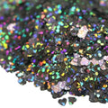 Black heart-shaped holographic biodegradable glitter with rainbow reflections