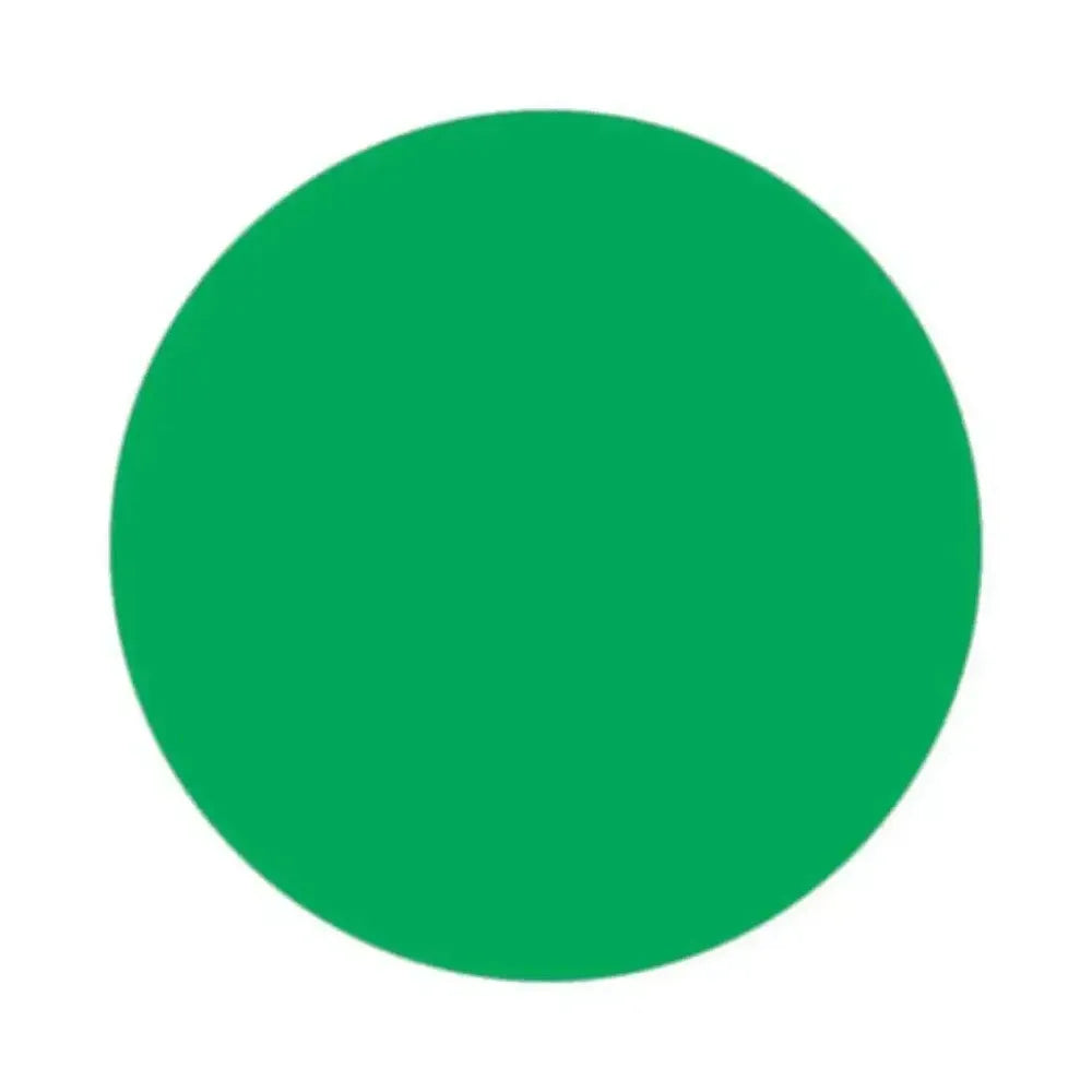 Solid green circular disc of Green Dye Powder