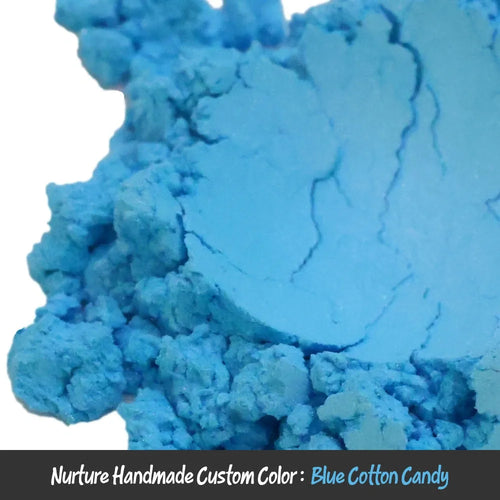 Vibrant blue cotton candy mica powder with fine crumbly texture and cracks