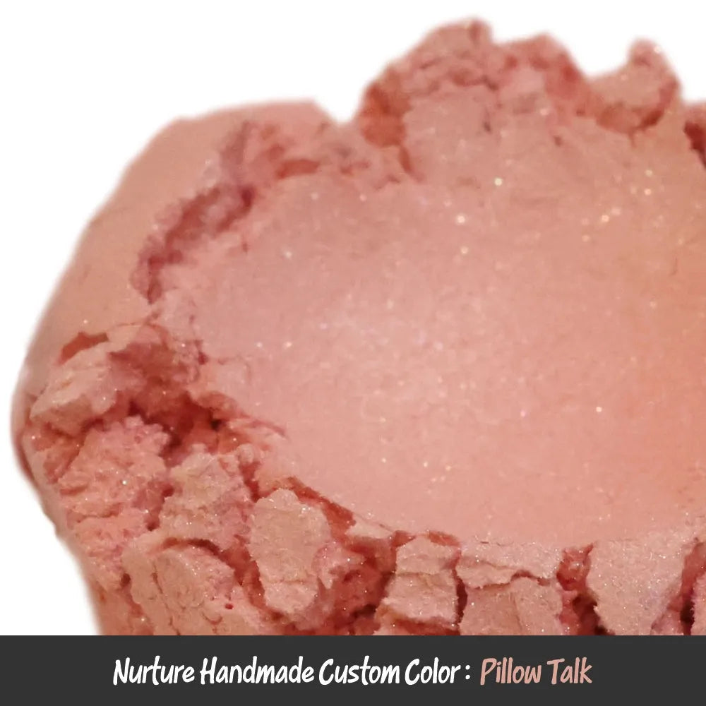 Pillow Talk Light Pink Mica: soft blush-pink pressed powder with shimmer and cracked surface