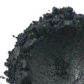 Black Pearl Mica powder pile with fine dark texture and shimmer