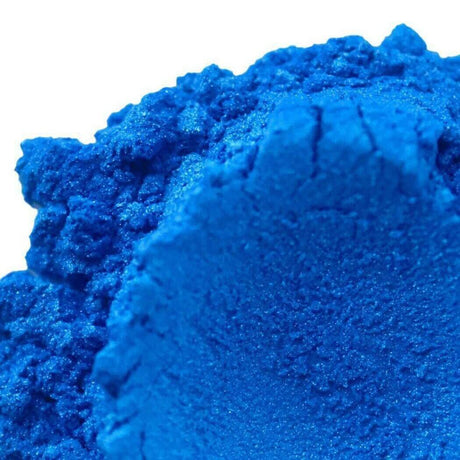 Close-up of vibrant blue pigment powder for handmade craft projects, Nurture Handmade