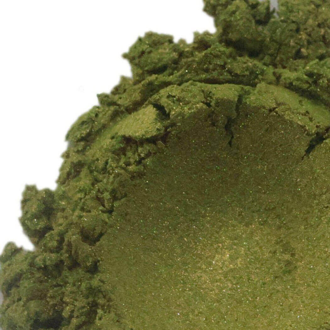 Close-up of green herbal powder from Nurture Handmade products