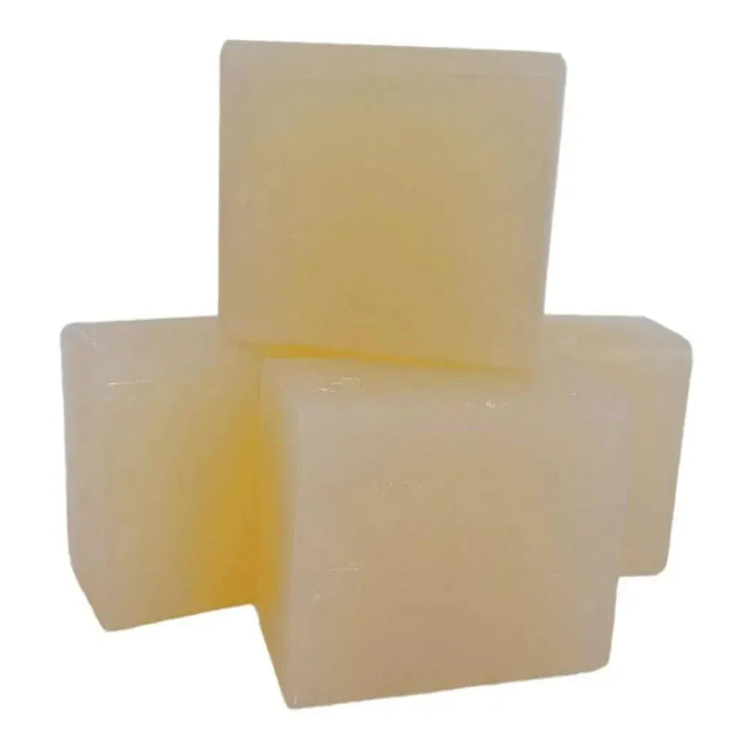 Three pale yellow translucent soap bars in cross formation, Low Sweat Clear Soap Base