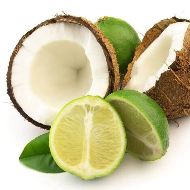 Fresh coconut and lime slices on white background - Nurture Handmade ingredients.