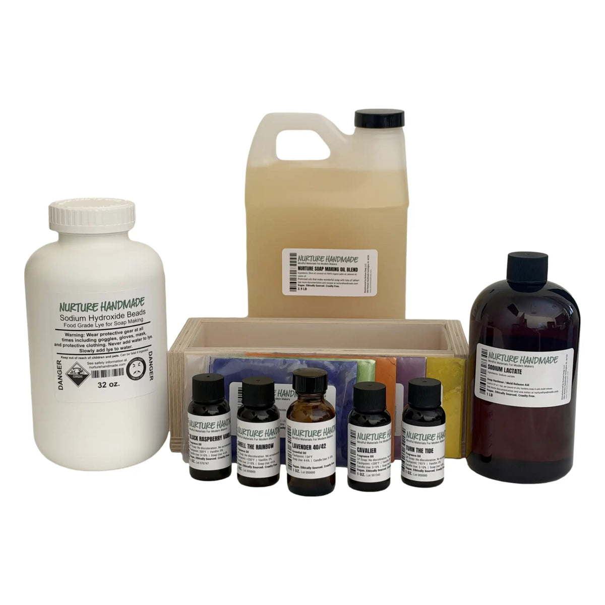 Cold Process Soap Making Kit with oils, lye, fragrance sample bottles, and soap mold