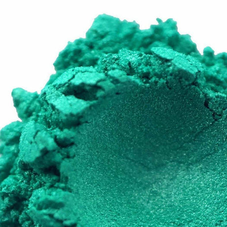 Close-up of vibrant green handmade eyeshadow by Nurture Handmade