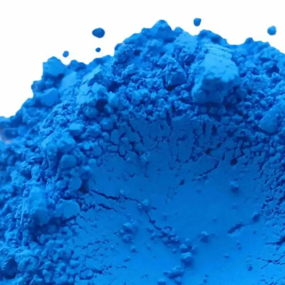 Vibrant fluorescent neon blue pigment powder with fine granular texture