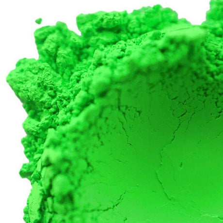 Close-up of vibrant green powder, showcasing its texture and vivid color. Ideal for nurturing handmade art and craft projects.