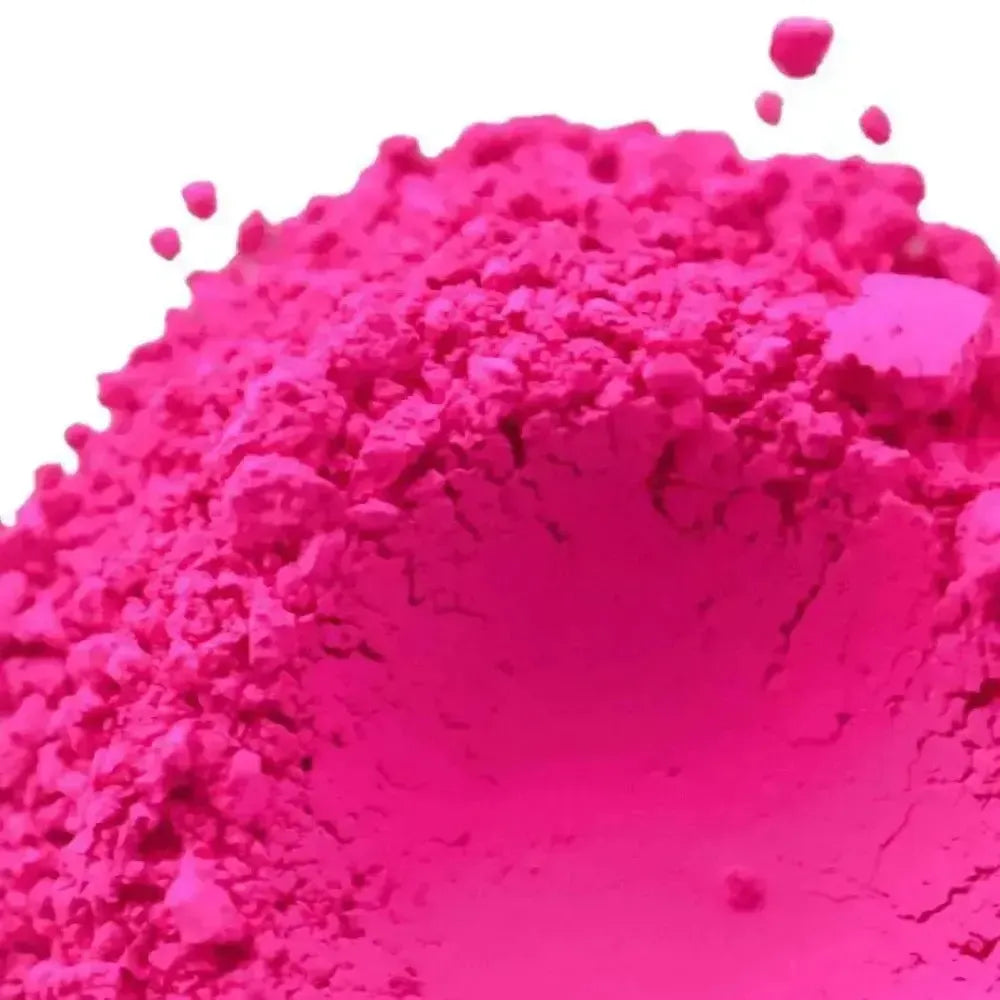 Vibrant fuchsia fine granular powder of Fluorescent Neon Magenta Pigment
