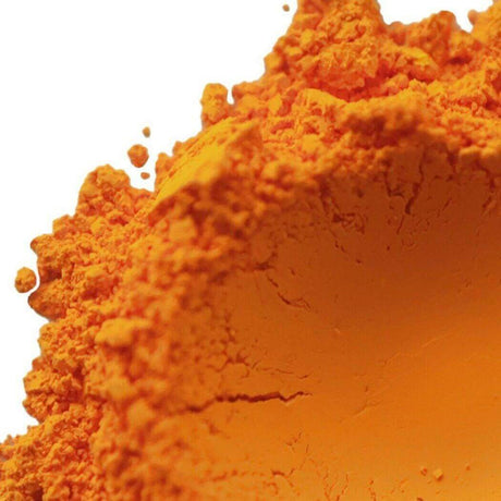 Vibrant orange powder texture symbolizing creativity and nurture handmade products.