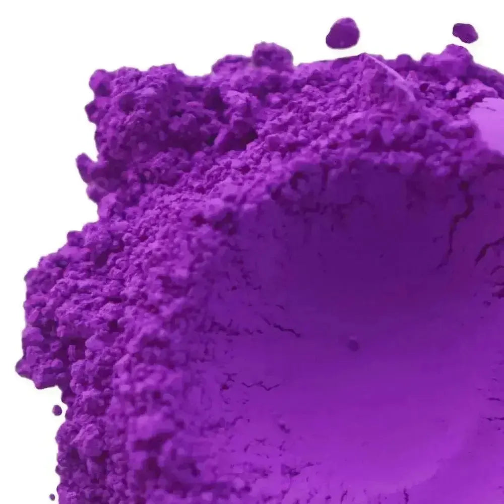 Fluorescent neon purple pigment powder with coarse granular texture