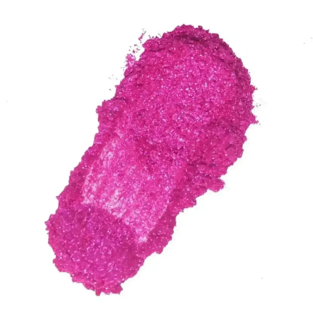 Vibrant fuchsia pink mica glitter powder with sparkling textured surface
