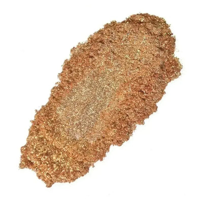 Swatch of coppery gold mica powder with metallic sparkle